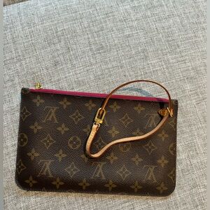 Authentic Louis Vuitton pouch/wrislet in excellent condition